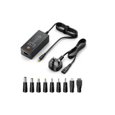 Black power adapter set with various connectors on a white background